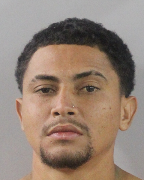 Booking photo of Reyzier Ortiz Serrano