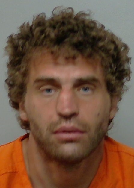 Booking photo of Peter Raschuk