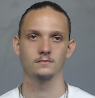 Booking photo of Tyler Lewis