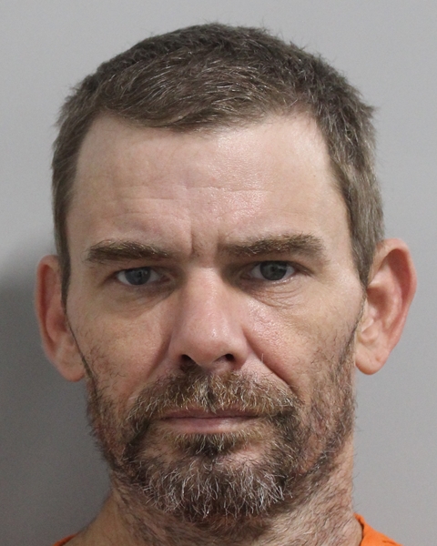 Booking photo of Adam Moore