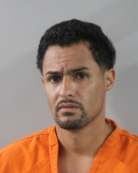 Booking photo of Christopher Cruz