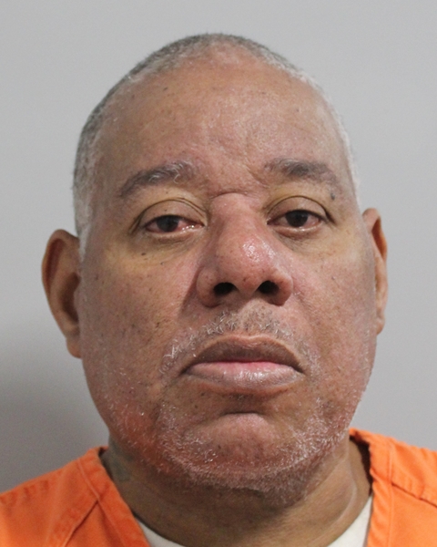 Booking photo of John Rogers
