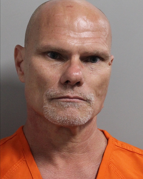 Booking photo of Christopher Brewer