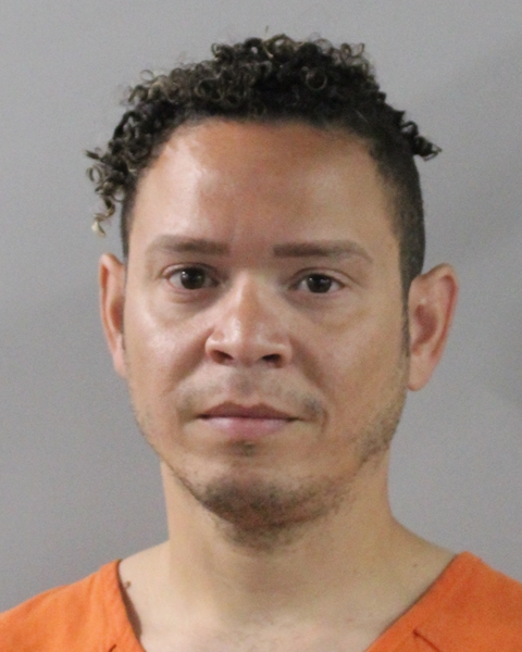 Booking photo of Alexy Santana Cruz