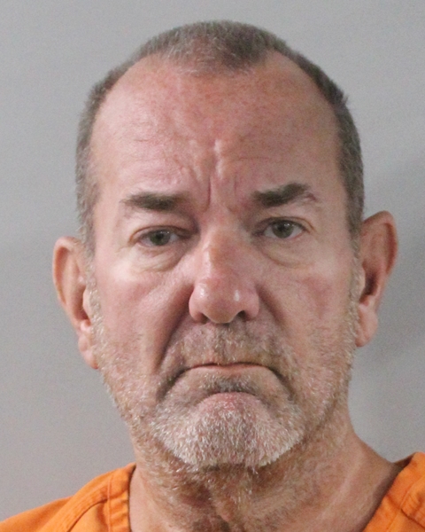 Booking photo of Douglas Mills