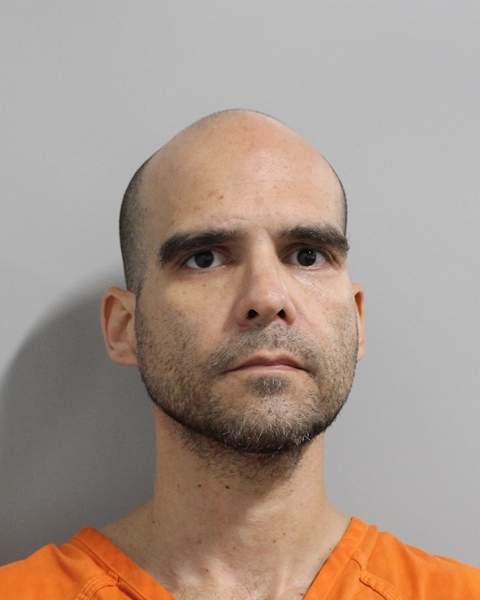 Booking photo of Carlos Llanos Cruz