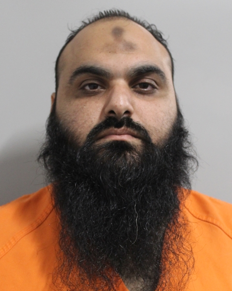 Booking photo of Momen Suliman