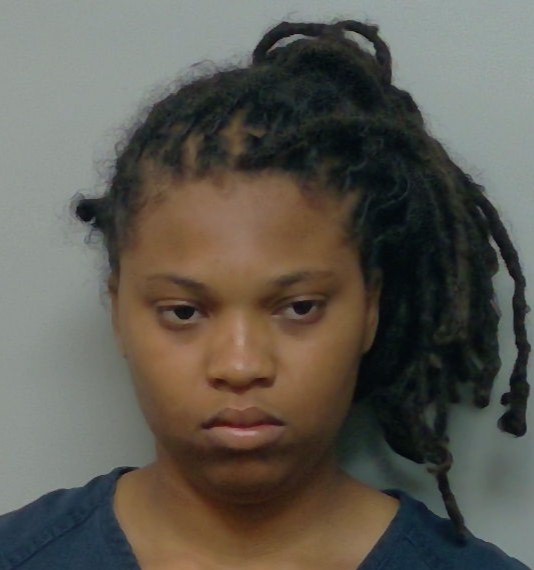 Imani Miller booking photo