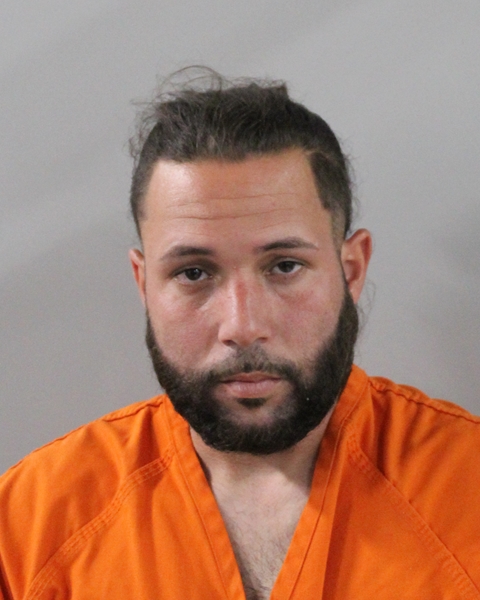 Booking photo of Christian Miguel-leon