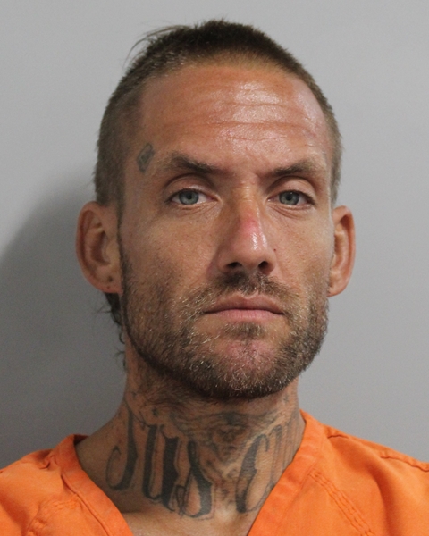 Booking photo of Michael Melanson