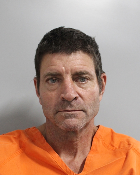 Booking photo of Guy Bayless