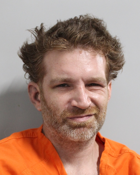 Booking photo of Scott Weintrabu