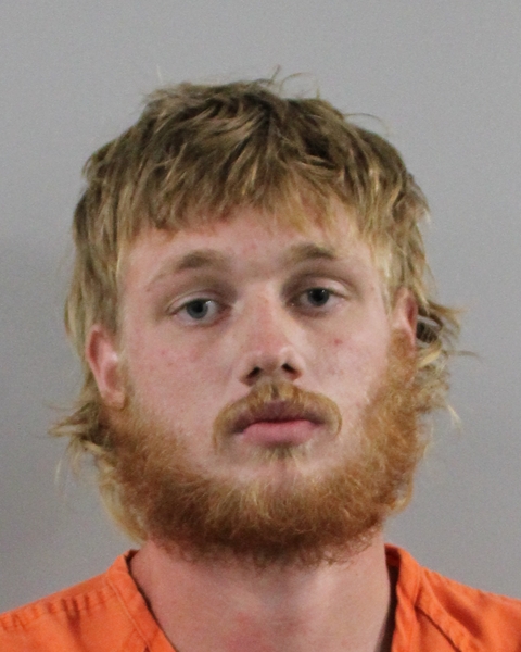 Booking photo of Jonathan Brewer