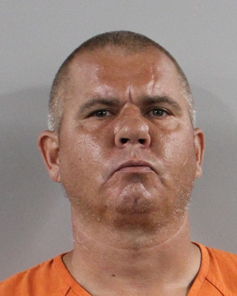 Booking photo of Derek Wyatt