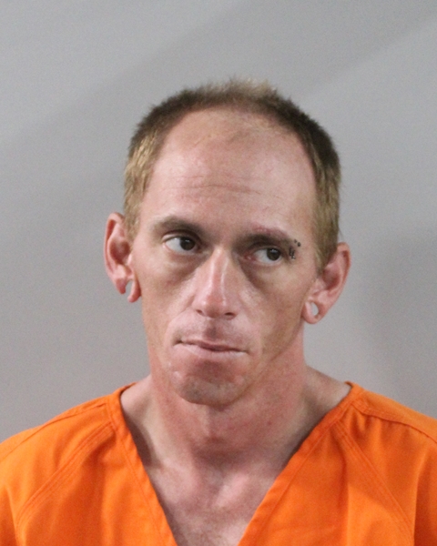 Booking photo of Jordan Pueschell