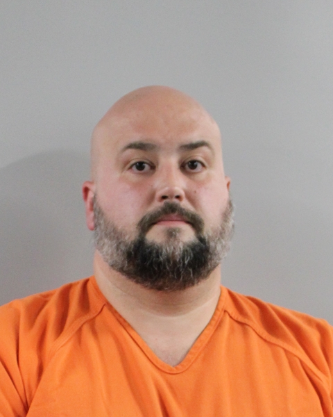 Booking photo of Derek Fernandez