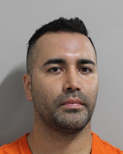 Booking photo of Miguel Melo Roa