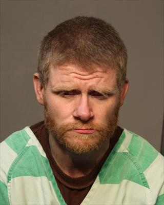 Booking photo of Johney Lee Spiewak