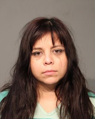 Booking photo of Naomie Berber
