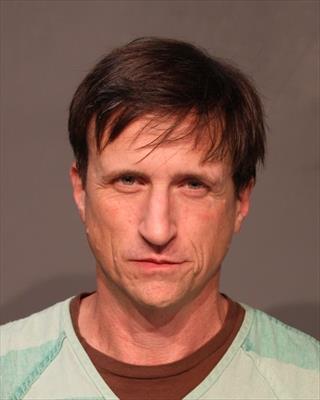 Booking photo of Jon Michael Zuber