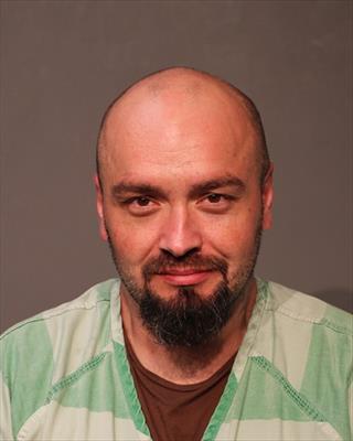 Booking photo of Jason Lee Benton