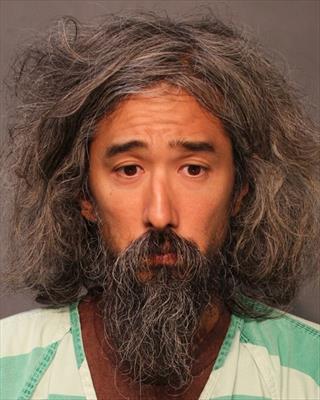 Booking photo of Esmond Myunghak Kim