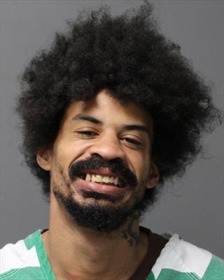 Booking photo of Michael Jermaine Jacobs