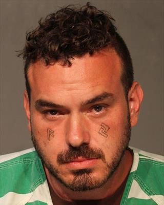 Booking photo of Adam Michael Jennings