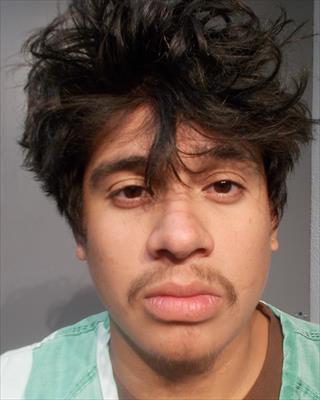 Booking photo of Eddie Gomez Castro