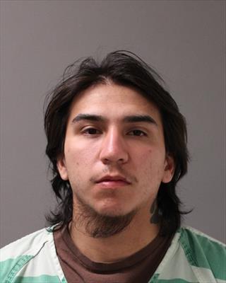Booking photo of Eric Edward Kapayou