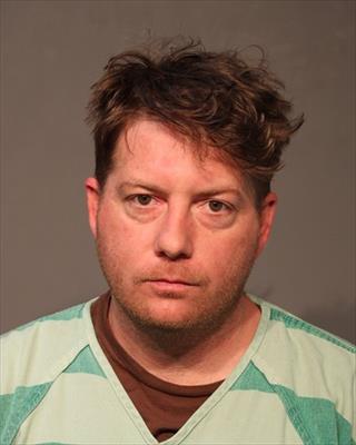Booking photo of Adam James Elmore