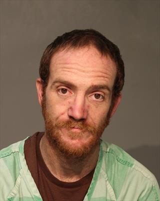 Booking photo of Aaron M Densley