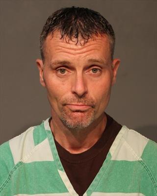 Booking photo of John Glenn Brackin