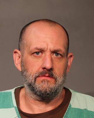 Booking photo of Jason Michael Renaud