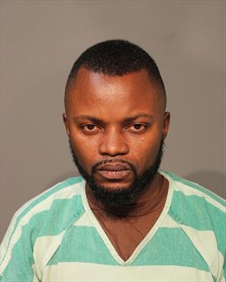 Booking photo of Mbalu Delphin