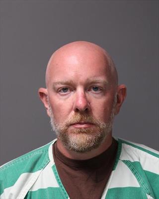 Booking photo of Mathew Bruce Greiner