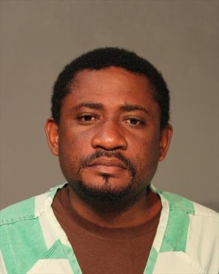 Booking photo of Lambert Mnena Wakabelwa