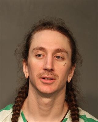 Booking photo of Christian Jude Carrington
