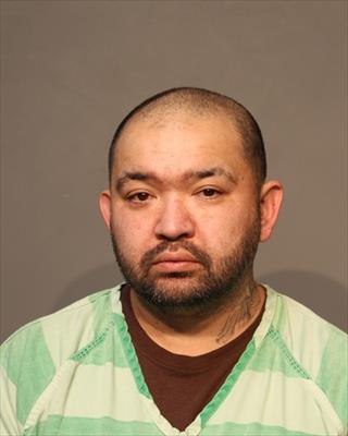 Booking photo of Michael Phouang Felton