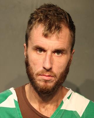 Booking photo of Justin Michael Carder