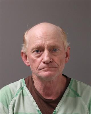 Booking photo of James Arthur Wilcoxson