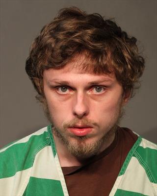 Booking photo of Austin James Reed