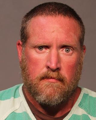 Booking photo of Eric Joseph Denin