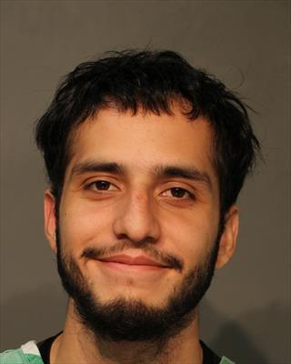 Booking photo of Michael Enrique Burgos