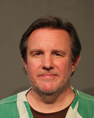 Booking photo of Robert Michael Brock