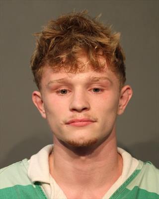 Booking photo of Roman Patrick Kile