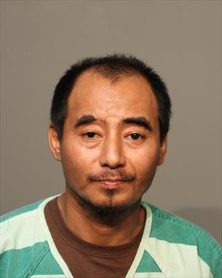 Booking photo of Ah Tung