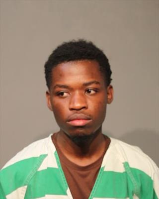 Booking photo of David Sikubwawo