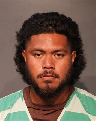 Booking photo of John Miracle Iele