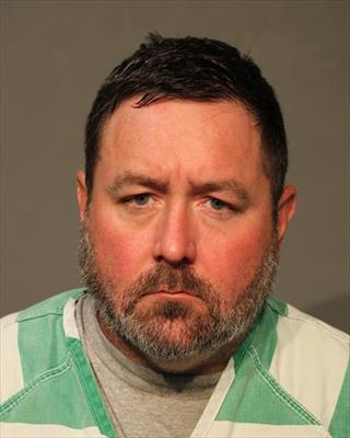 Booking photo of Travis Eugene Miles